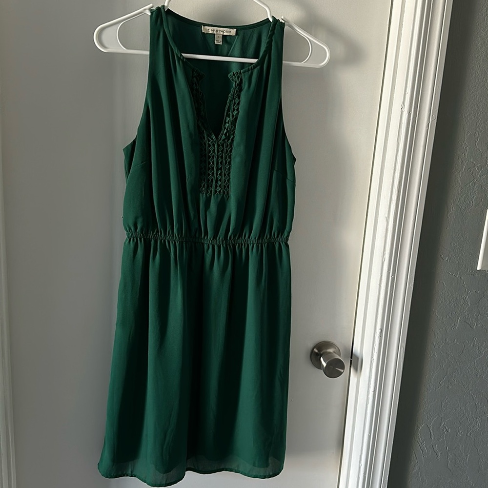 Sleeveless, knee length green dress